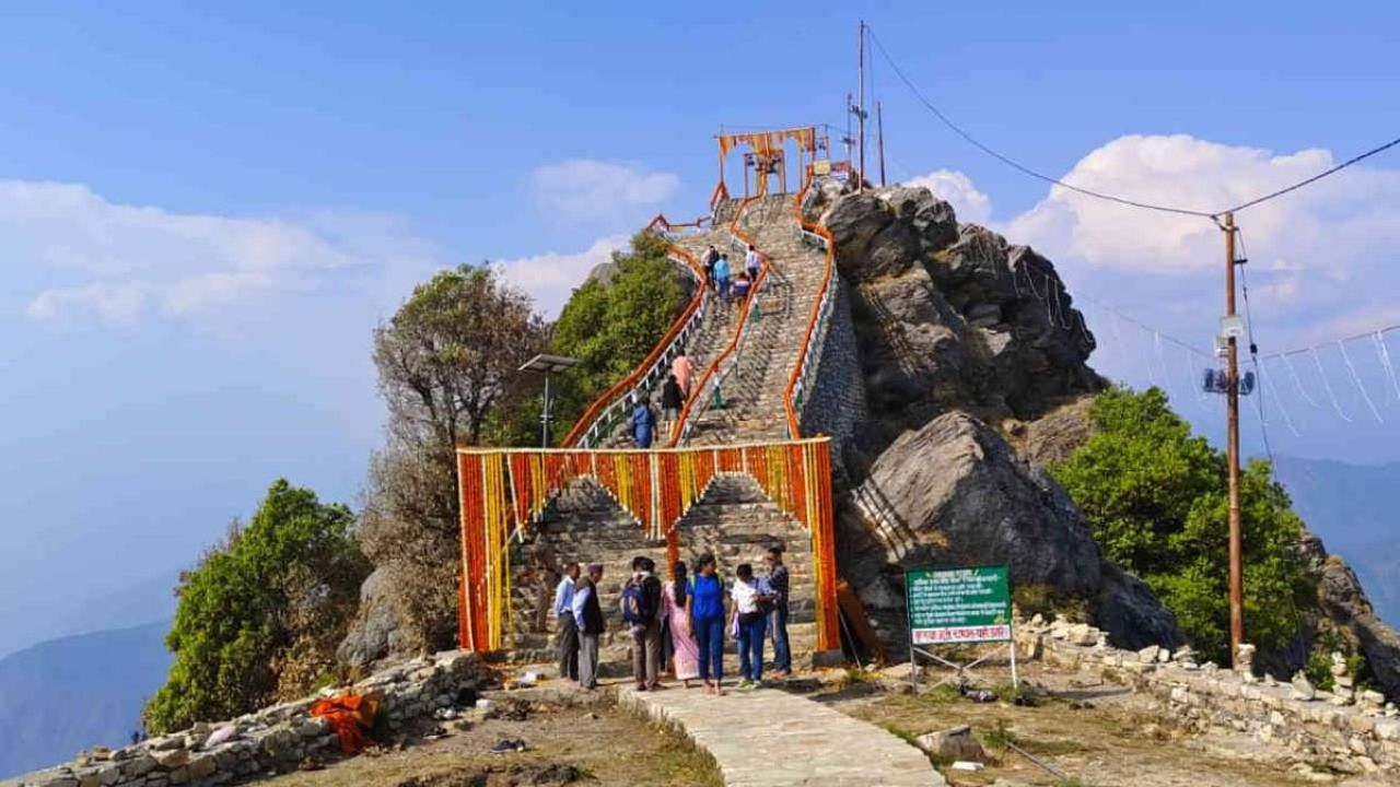 Travelers hiking through forest trail during Kartik Swami Temple trek in Uttarakhand